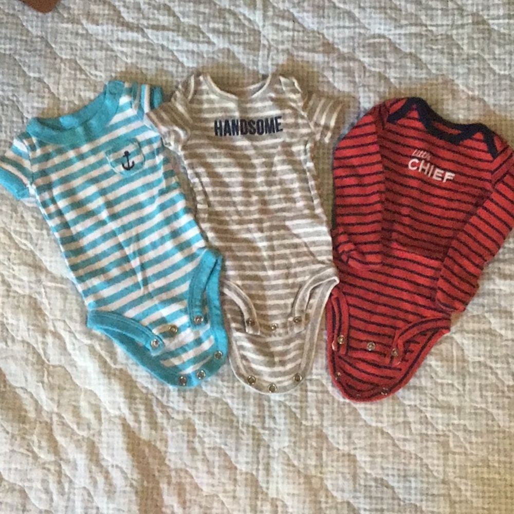 Baby onesies never used.